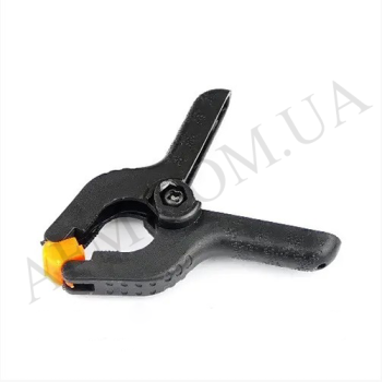 Затискач 2 для фіксації дисплейного комплекту в корпусі при установці вимагає склеювання